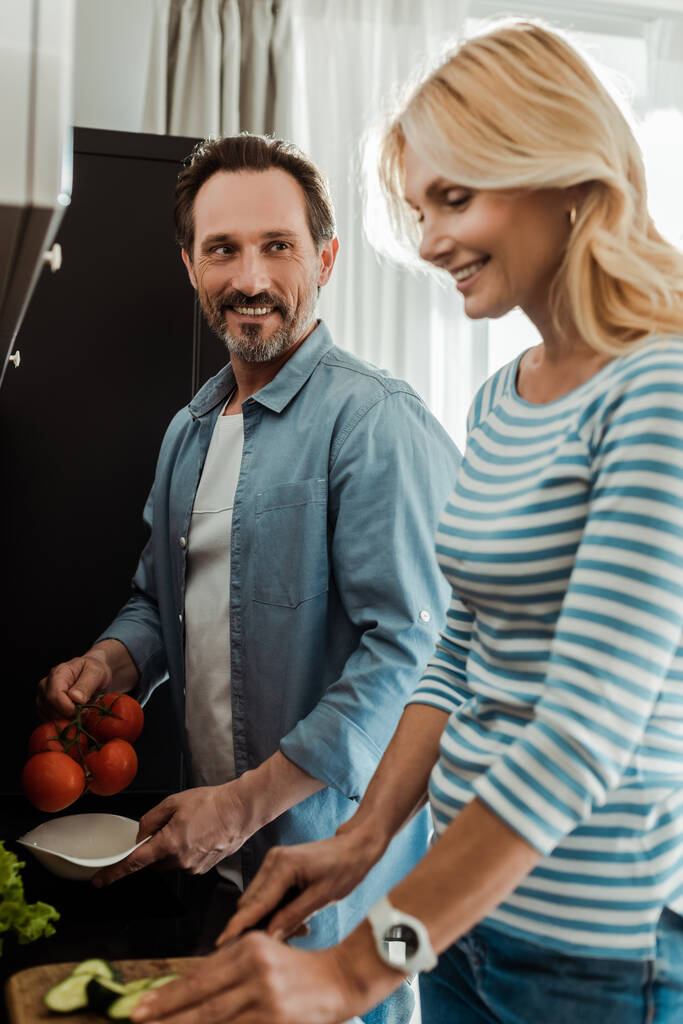 cooking salad in kitchen