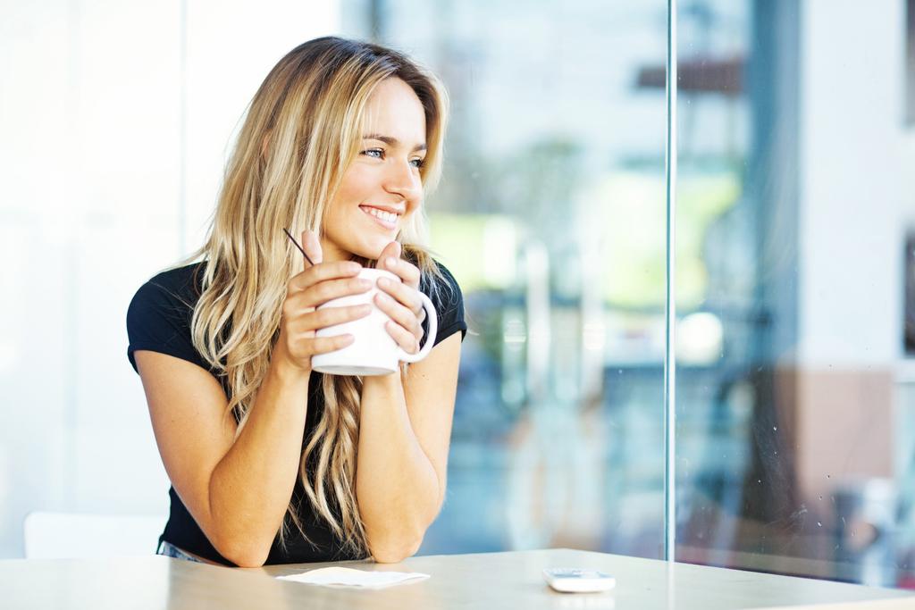 Woman drinking coffee