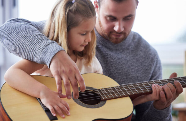 How (and Why) You Should Teach Your Kids to Play Guitar